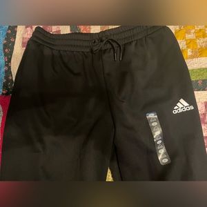 Black Adidas sweatpants